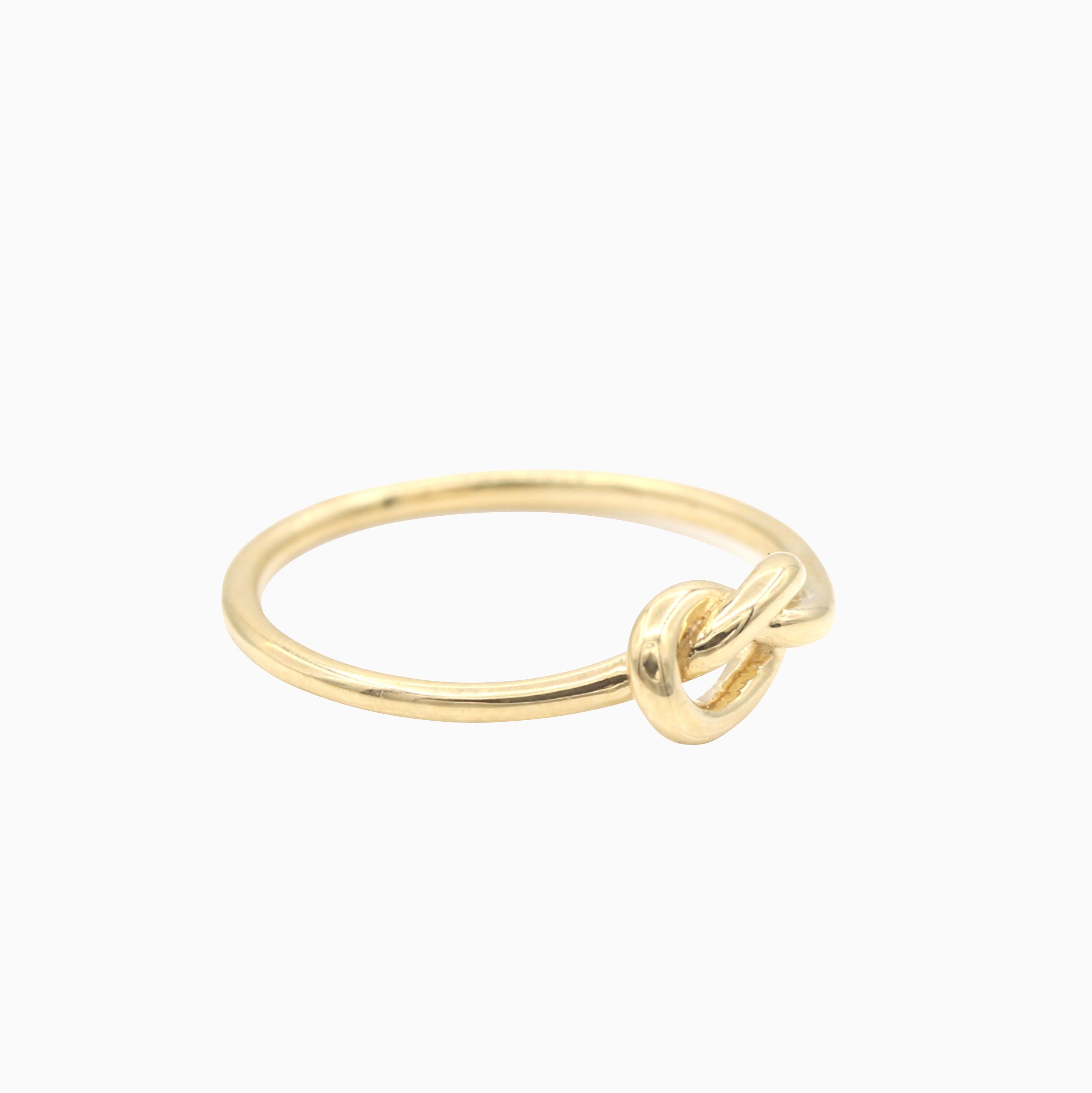 14k Yellow Gold Forget Me Knot Ring, side view from left with a glimpse of the knot design