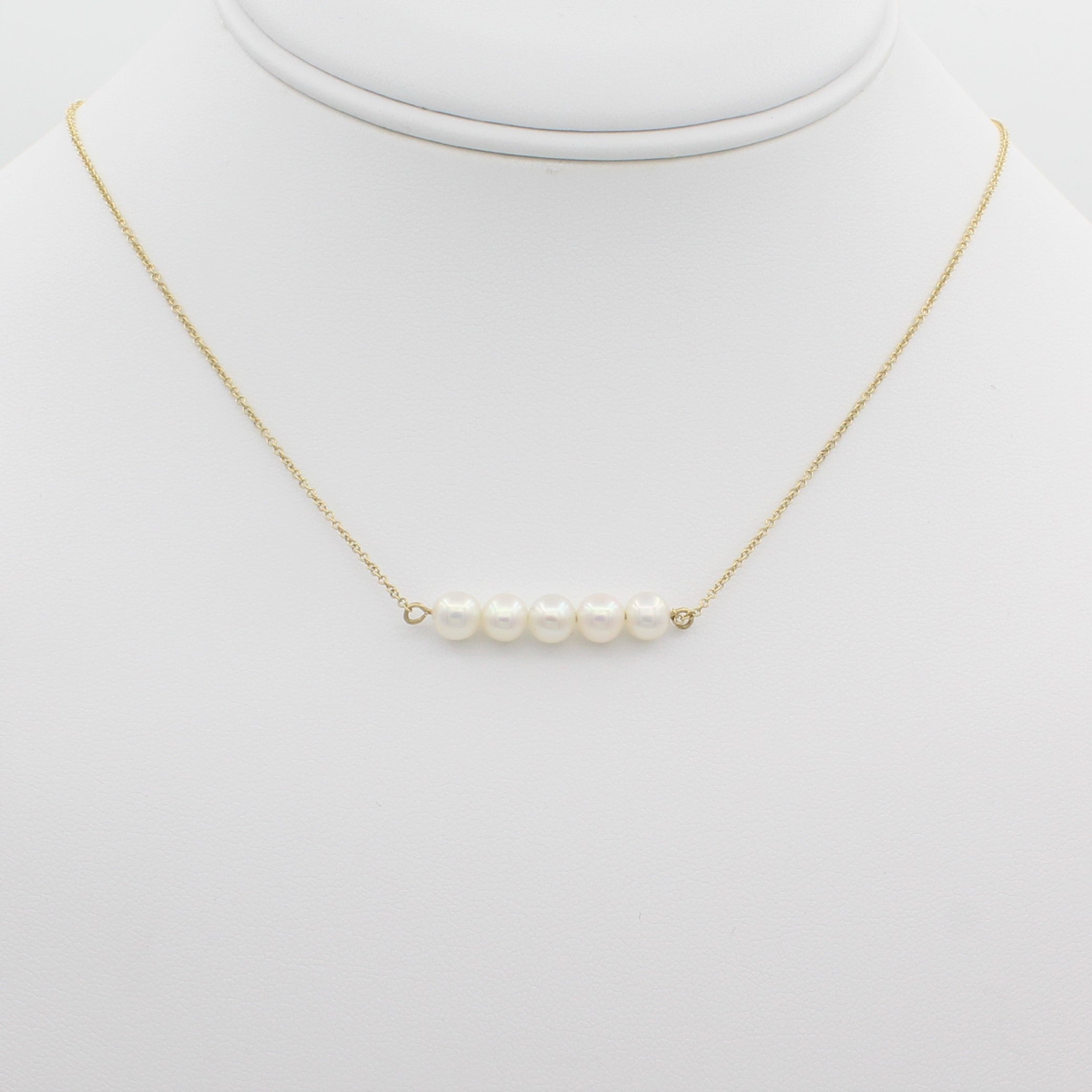 14k Yellow Gold Cultured Freshwater Pearl Bar Pendant, front view of necklace displayed on a mannequin. 