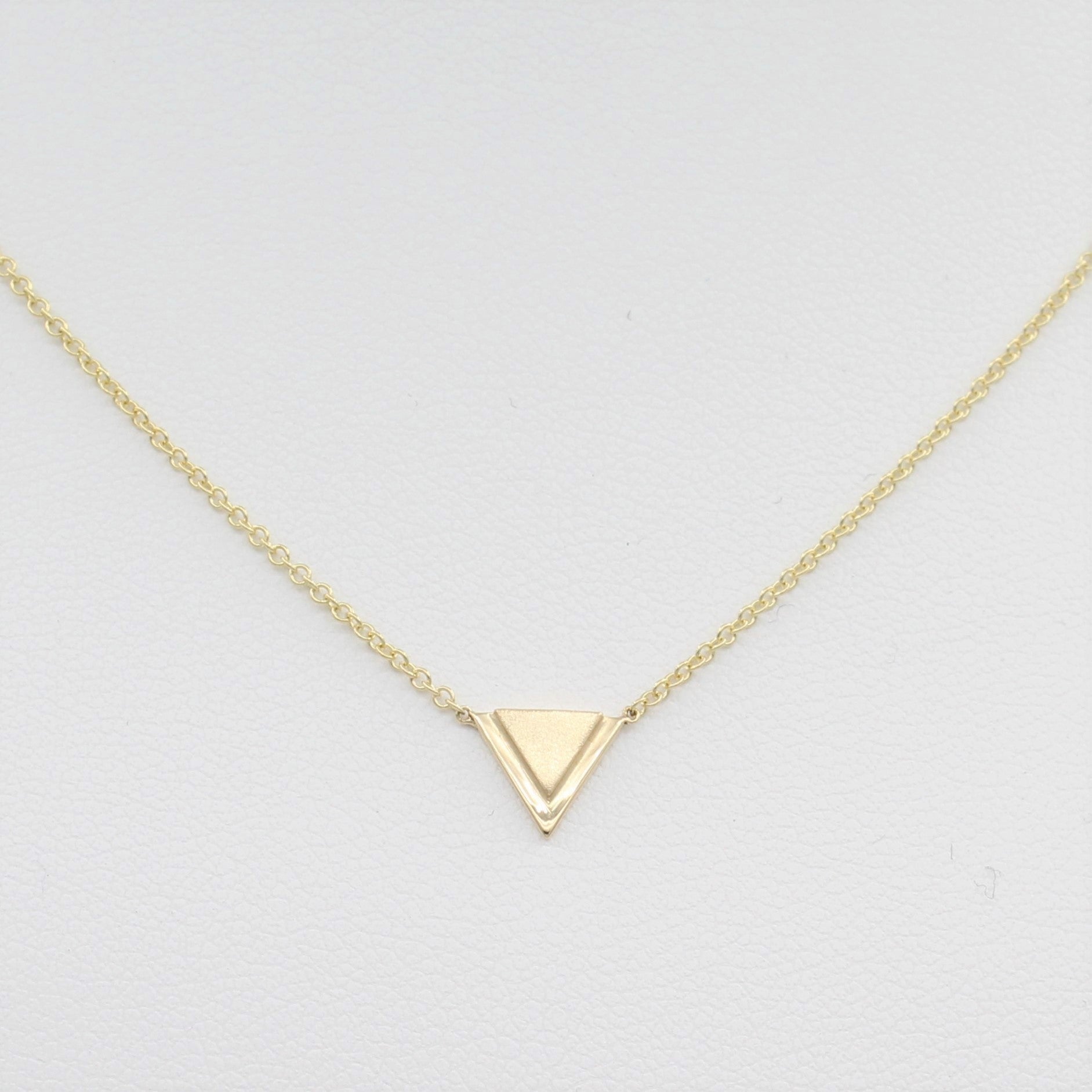 14k Yellow Gold Petite Double Triangle Single Station Pendant, close-up front view of necklace highlighting the double triangle pendant. 