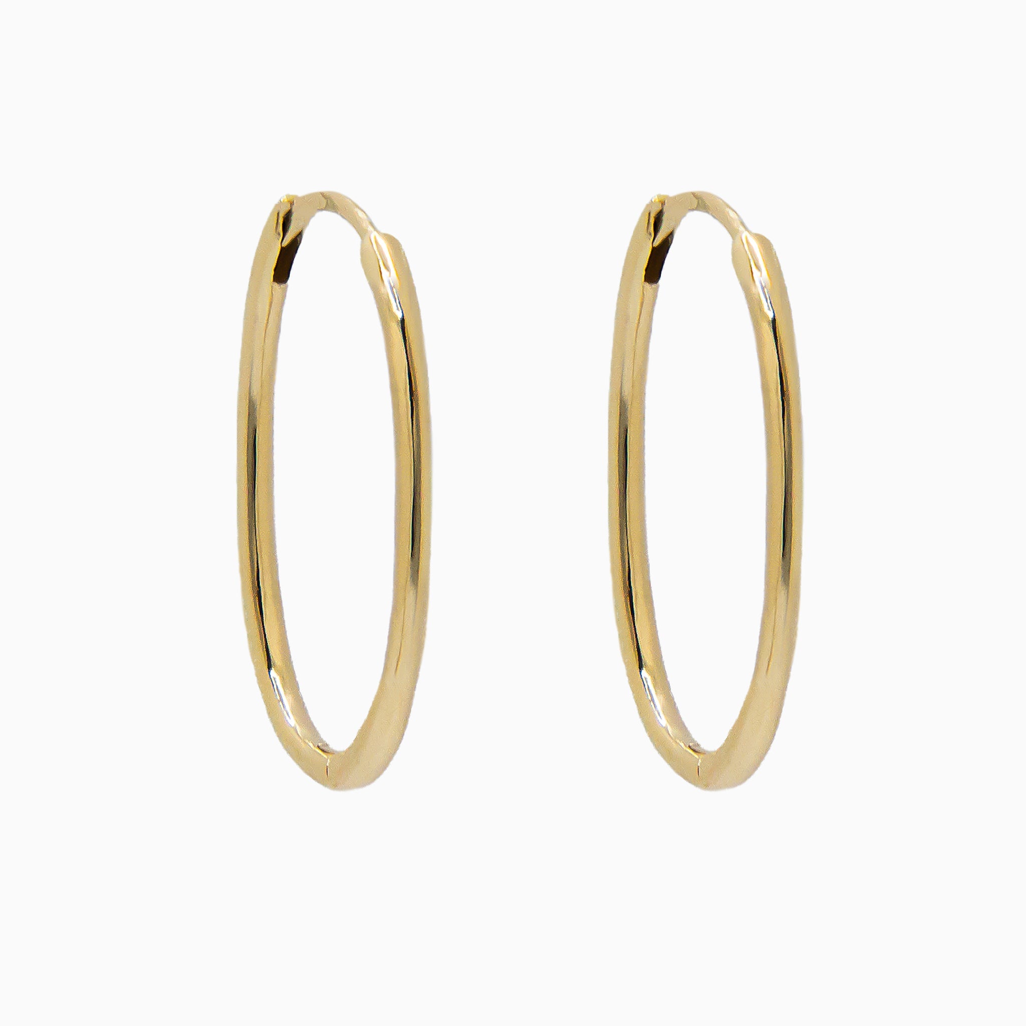 14k Gold 23mm x 15mm Hinged Everyday Oval Hoop Earrings - Starflower Design