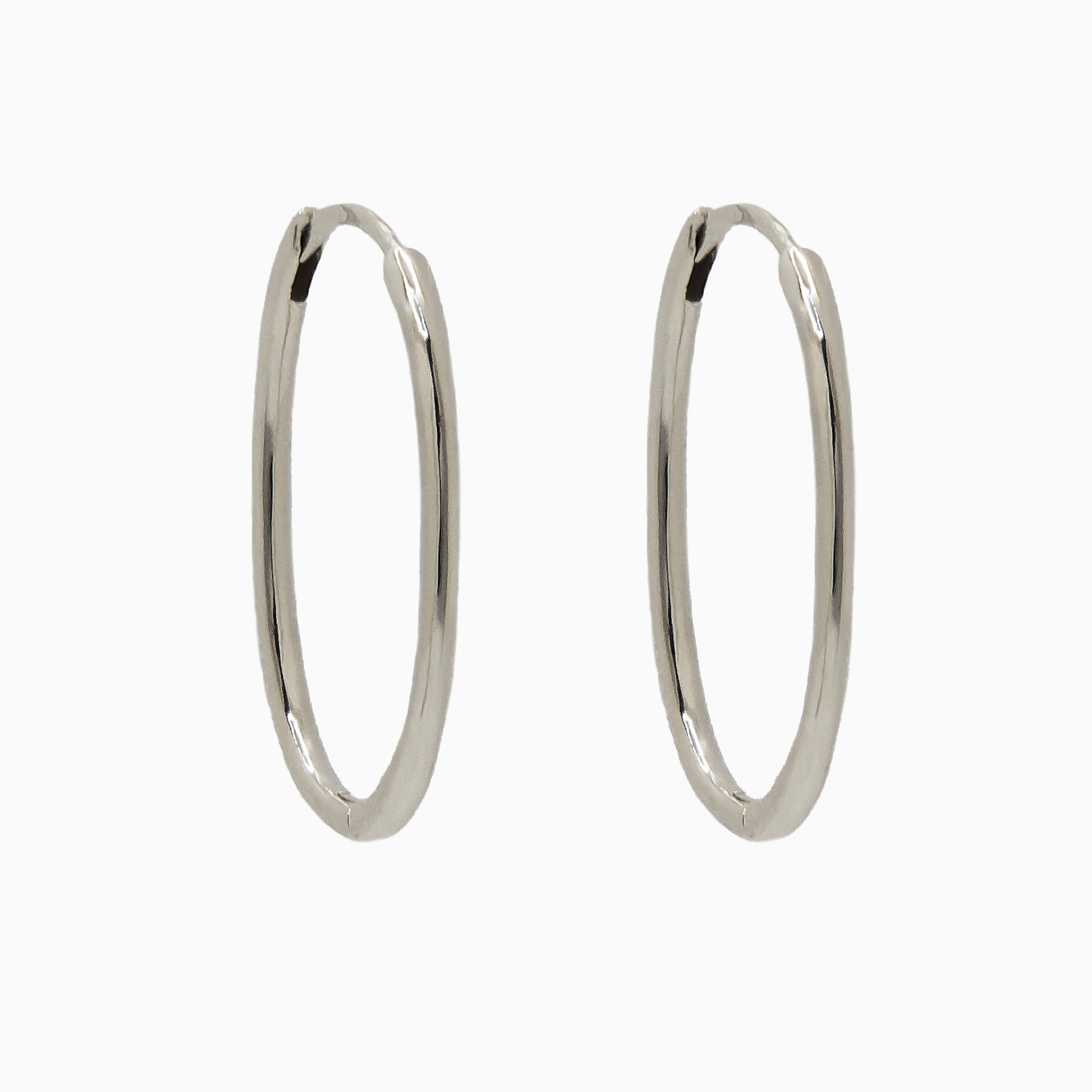 14k Gold 23mm x 15mm Hinged Everyday Oval Hoop Earrings - Starflower Design