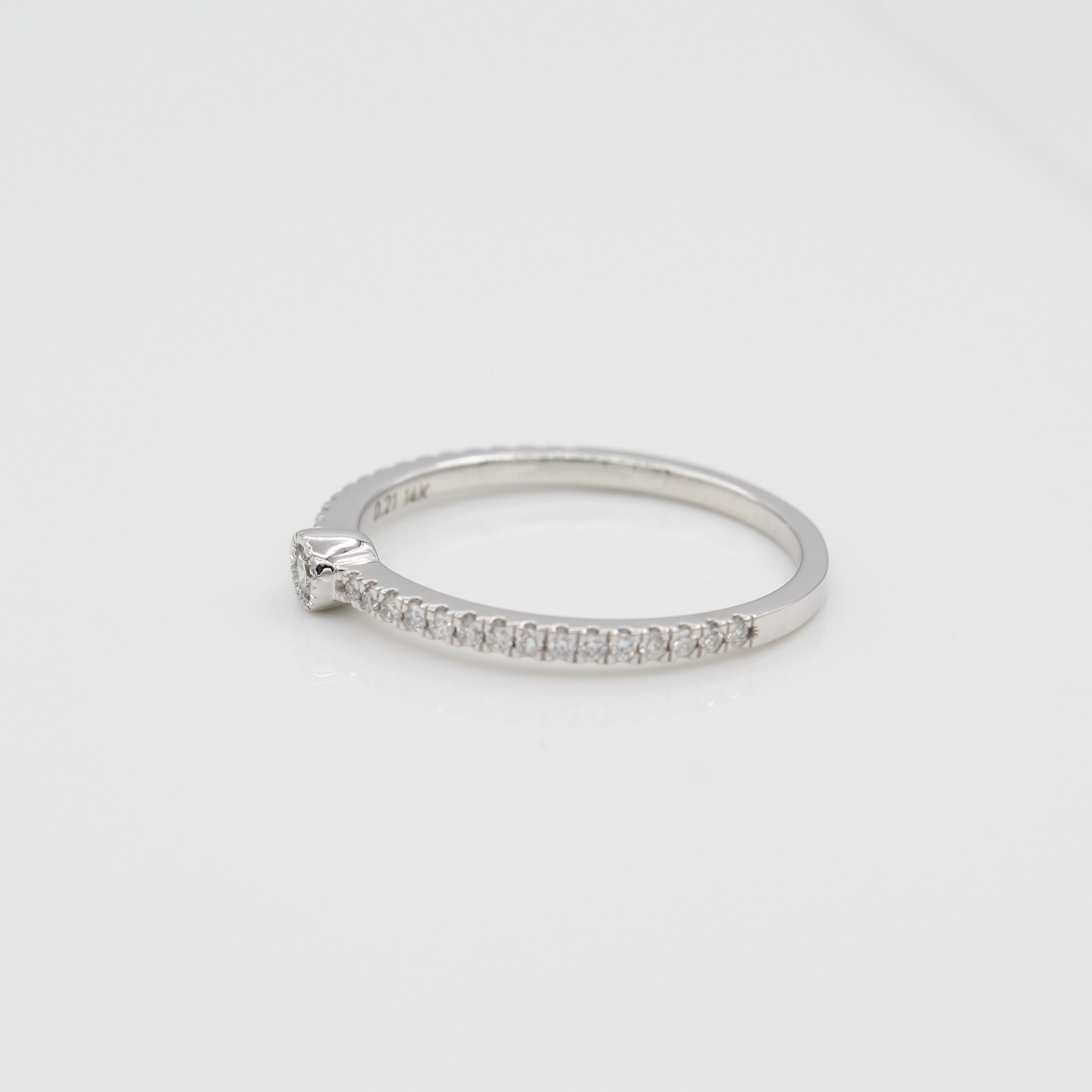 14k White Gold Single Bezel-Set Diamond Station Ring with Micro-Pave Band, side view from right.