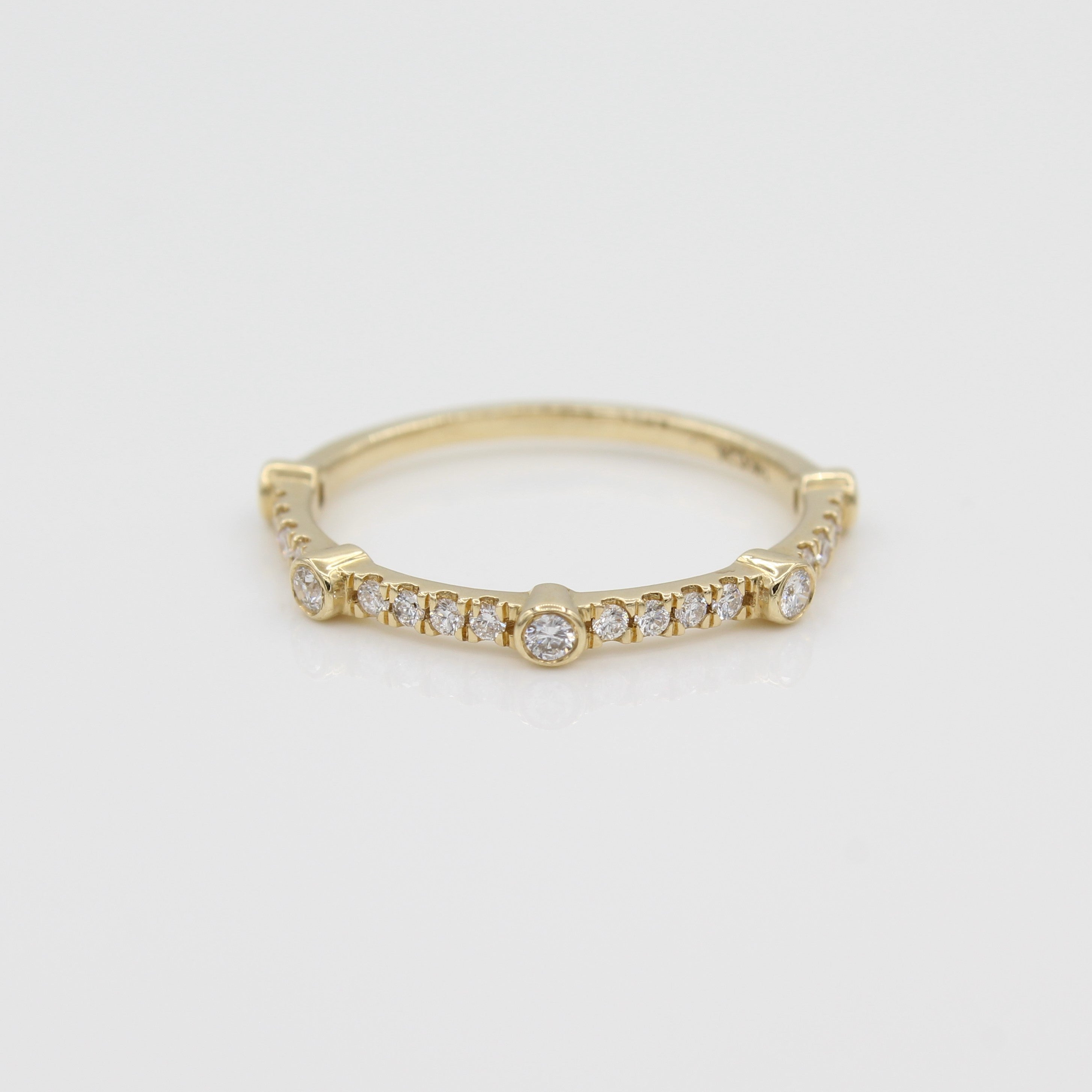 14k Yellow Gold Bezel-Set Diamond 5 Station Ring with Micro-Pave Band, front view. 