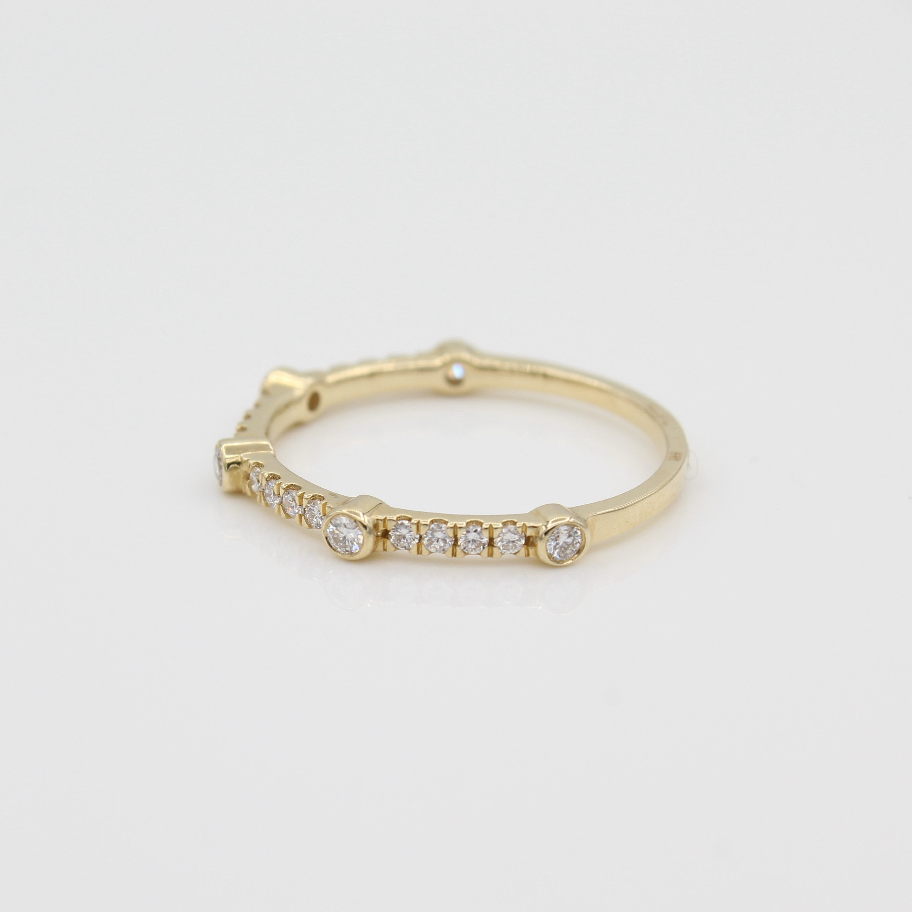 14k Yellow Gold Bezel-Set Diamond 5 Station Ring with Micro-Pave Band, side view from right. 