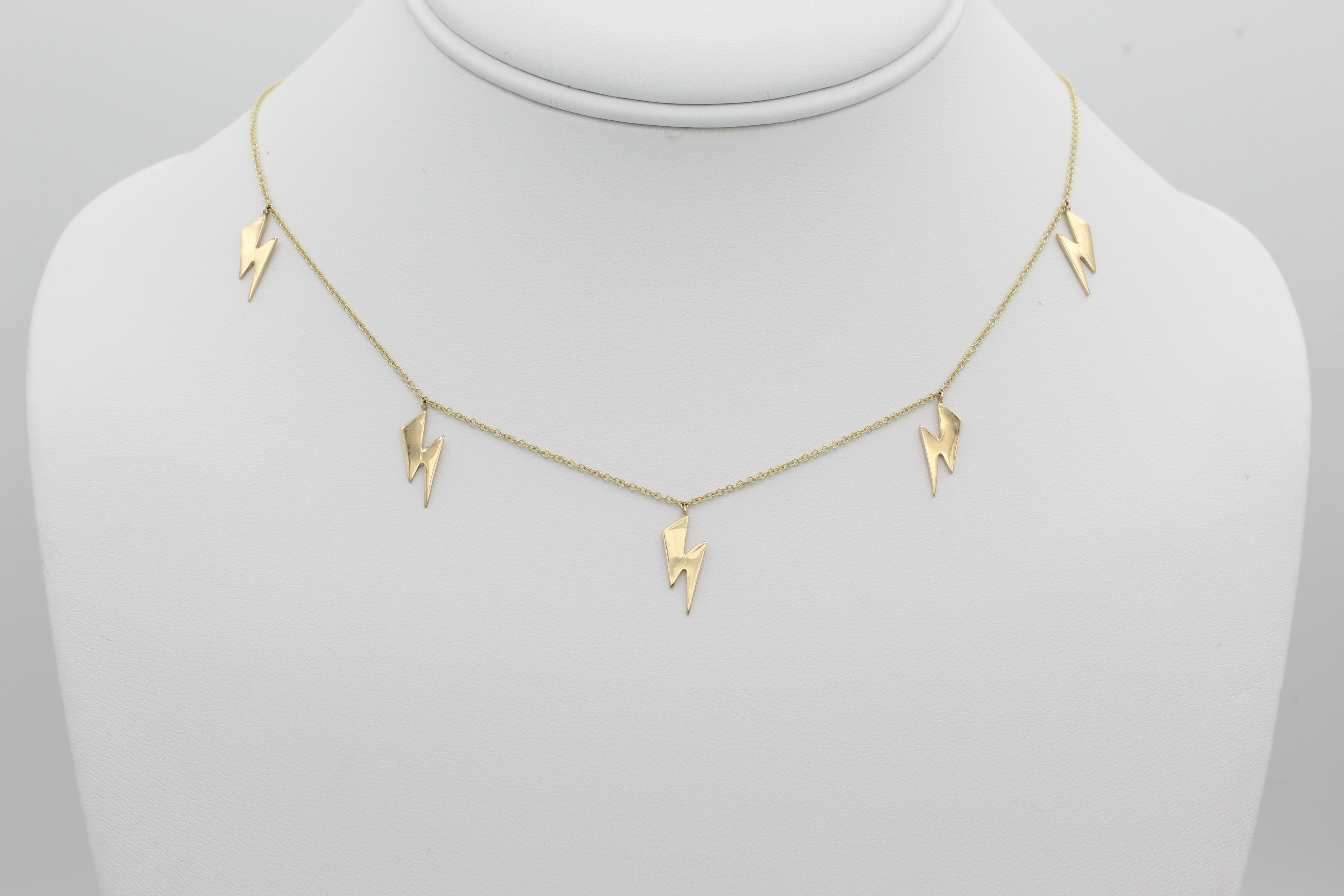 14k Yellow Gold Lightning Bolt Five Station Necklace, front view of necklace displayed on a mannequin.