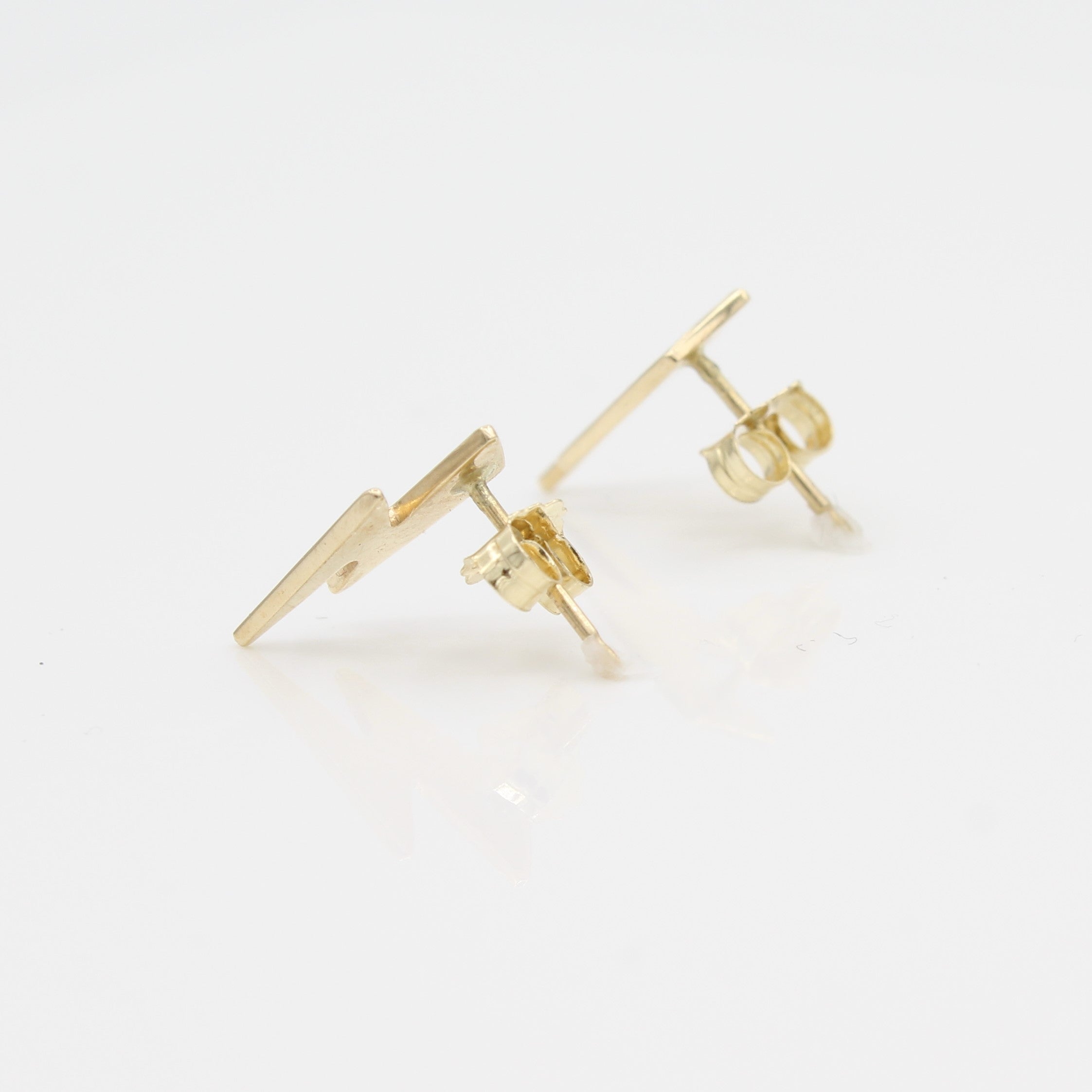 14k Yellow Gold Striking Lightning Bolt Earrings, side view from right with a peak of earring posts and backs. 