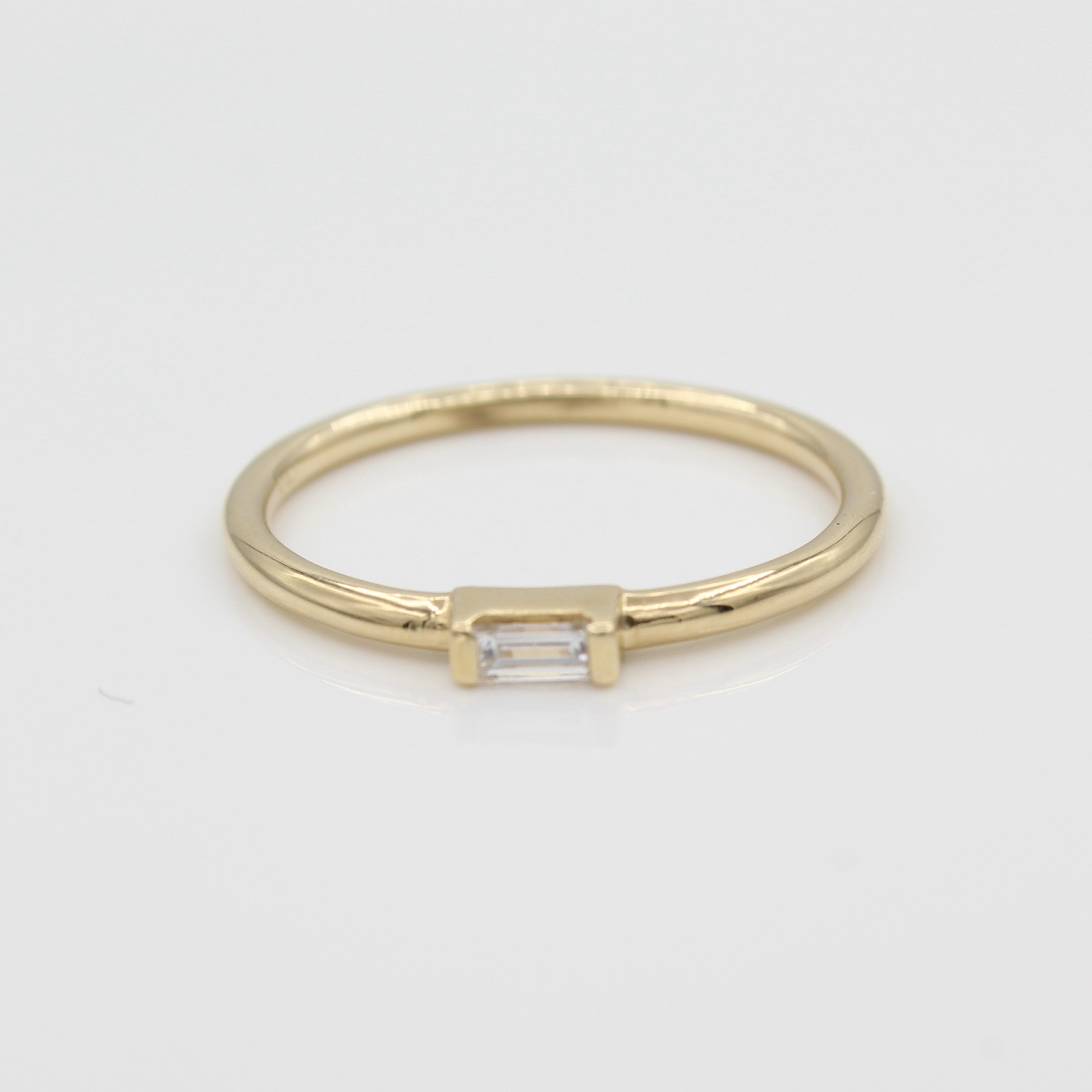 14k Yellow Gold East-West Diamond Baguette Stackable Ring, close-up front view highlighting the diamond design. 