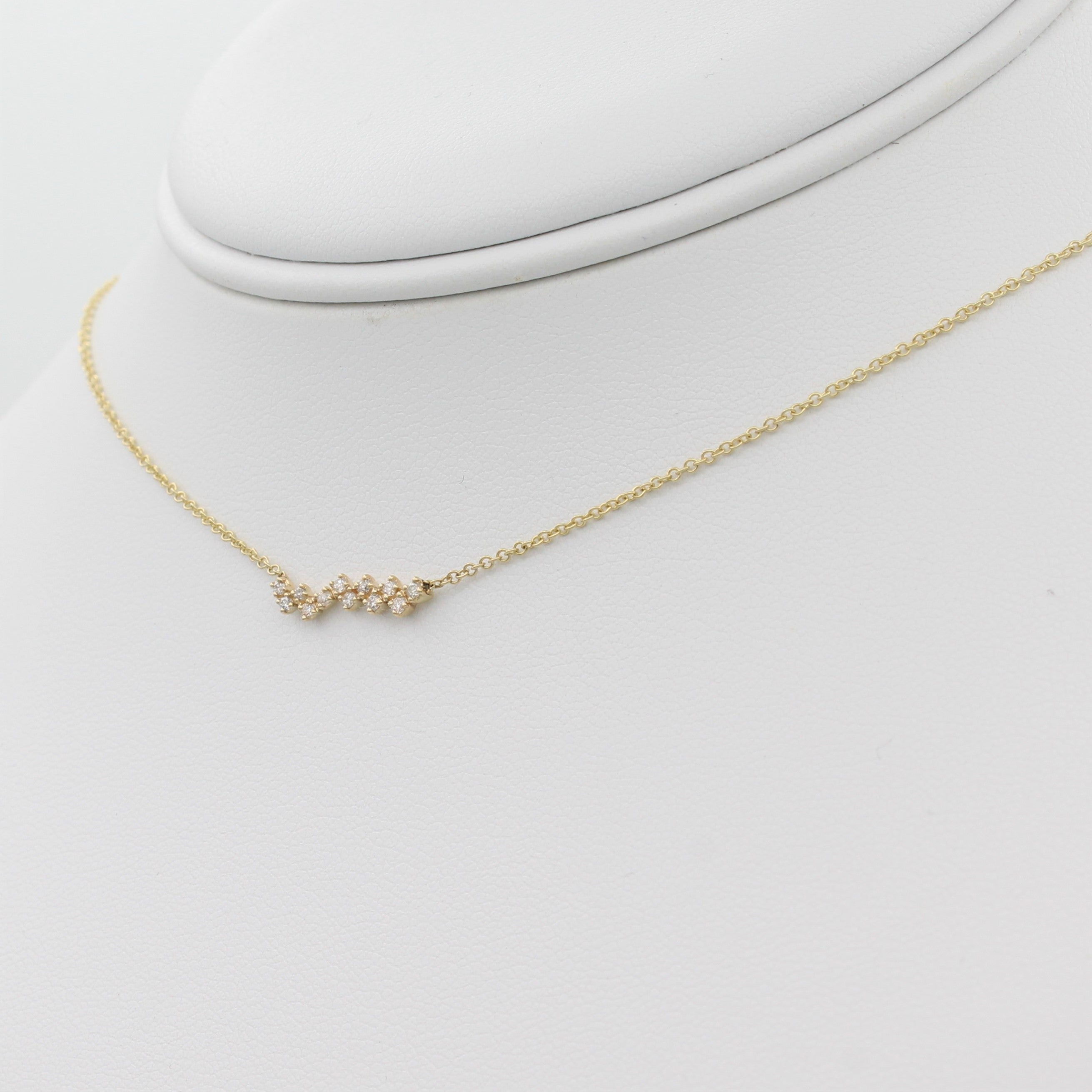 14k Yellow Gold Zig-Zag Diamond Bar Pendant, right angle view of necklace displayed on a mannequin.